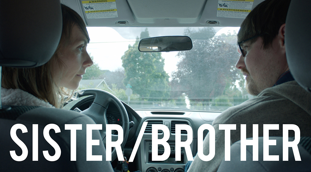 a woman and man in a car in a still from the film Sister/Brother by Brian Padian